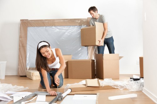 Office relocation planning in Barking with boxes and desks