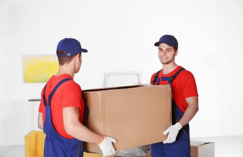 Local Barking moving team handling boxes and household items