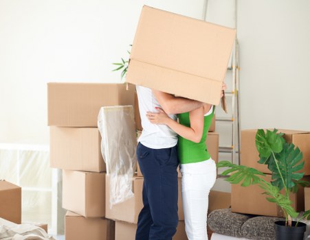 Packaged business items and labelled boxes ready for commercial removals