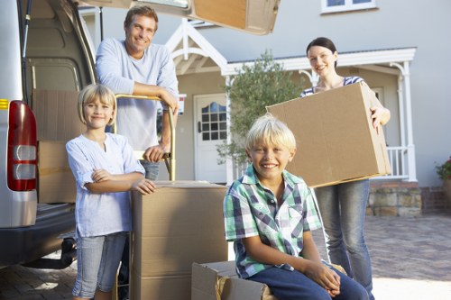Van and mover assisting with residential transport in Barking