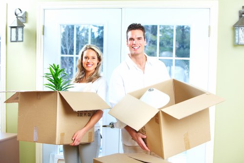 Loading household furniture into a removal van
